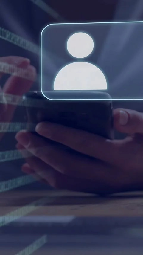 Vertical video: Man holding phone, tapping screen and causing avatars, growing Stock Footage 335740988