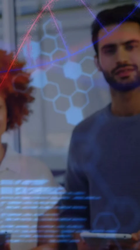 Vertical video: Man holding tablet sparking hex AR crossing them as cam Stock Footage 331030605