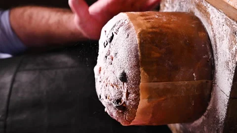 Vertical video. Man holds in hands Panettone of Milan. Traditional Italian pastr Video stock 143296835