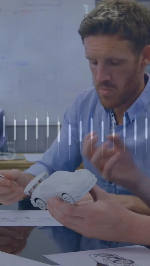 Vertical video: Man inspecting car model on peer gesture, noting design, Stock Footage 330195764
