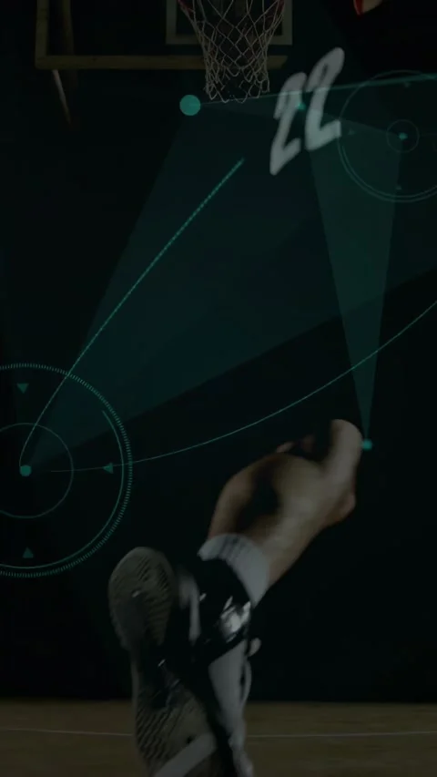 Vertical video: Man jumping to rim after animated node sweeping, sport FX Stock Footage 332598598