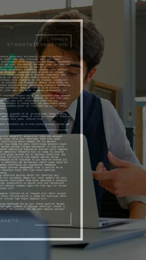 Vertical video: Man at laptop scanning code while CYPHER overlay rising, peer Stock Footage 333465106
