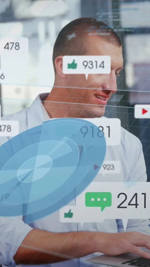 Vertical video: Man at laptop typing while alerts popping, numbers shifting, Stock Footage 332823460
