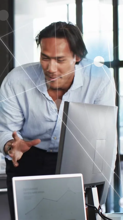 Vertical video: Man leaning and reaching after hand, showing nodes overlay on Stock Footage 334377853