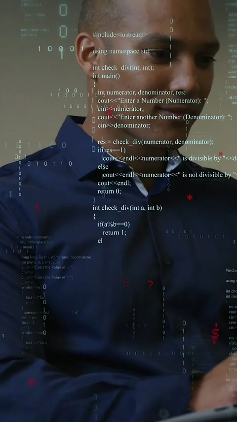 Vertical video: Man leaning in and typing on laptop, testing code with binary Stock-Footage 335355224