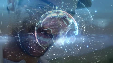 Vertical video: Man leaning, gazing, activating holo globe, showing data nodes Stock Footage 334112394