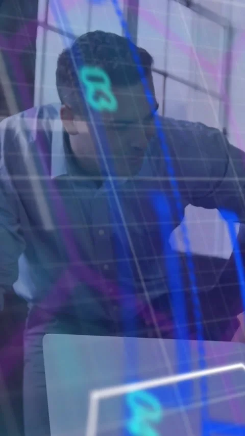 Vertical video: Man leaning in from left helping peer on laptop for IT, overlays 스톡 동영상 331009676