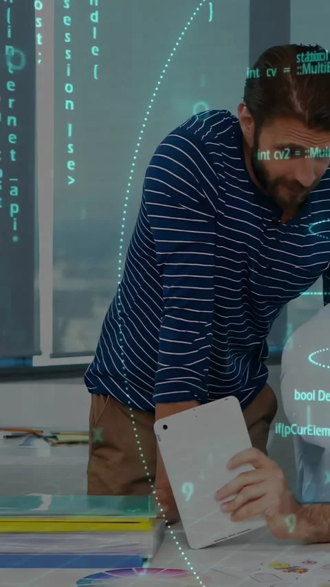 Vertical video: Man leaning over table while peer rotating tablet, causing code Stock Footage 334396289