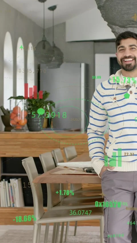 Vertical video: Man leaning at table, camera panning, AR charts overlaying him Stock Footage 337538962