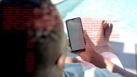 Vertical video: Man lounging poolside, tapping phone, causing red code overlay, Stock Footage 333300731