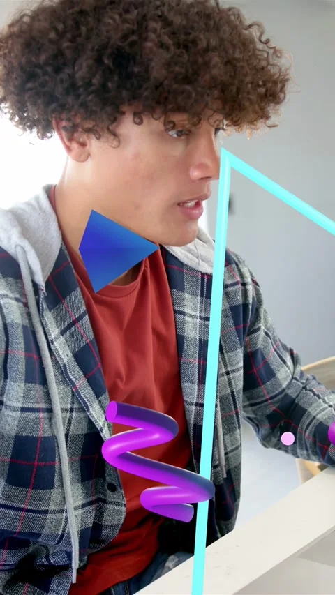 Vertical video: Man lowering mug looking at laptop and typing for IT while AR Stock Footage 333464960
