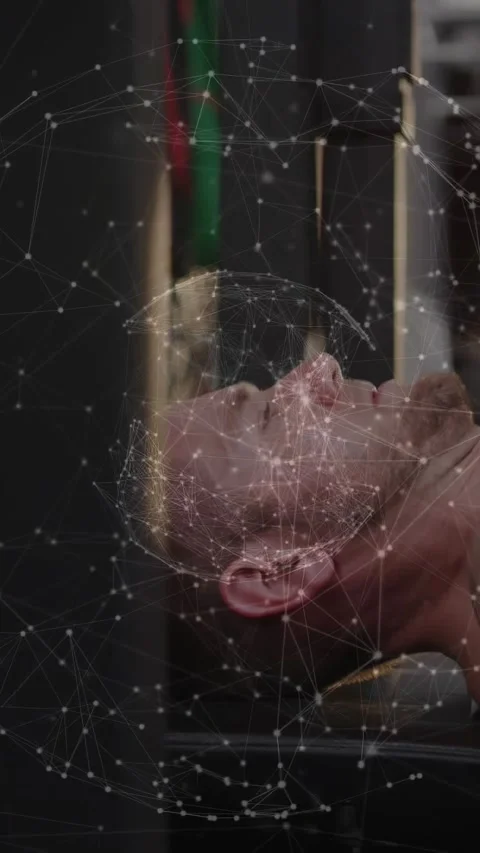 Vertical video: Man lying on bench as system initiating node network around head 스톡 동영상 330982250