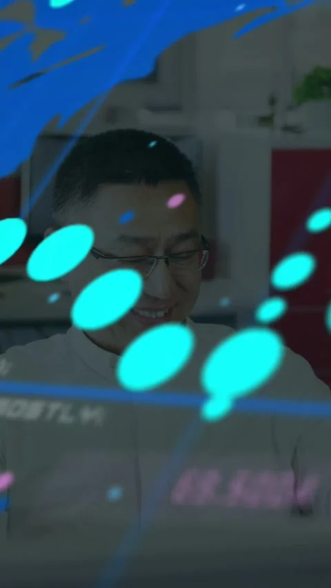 Vertical video: Man on phone, checking business data while animated numbers Stock Footage 333451350