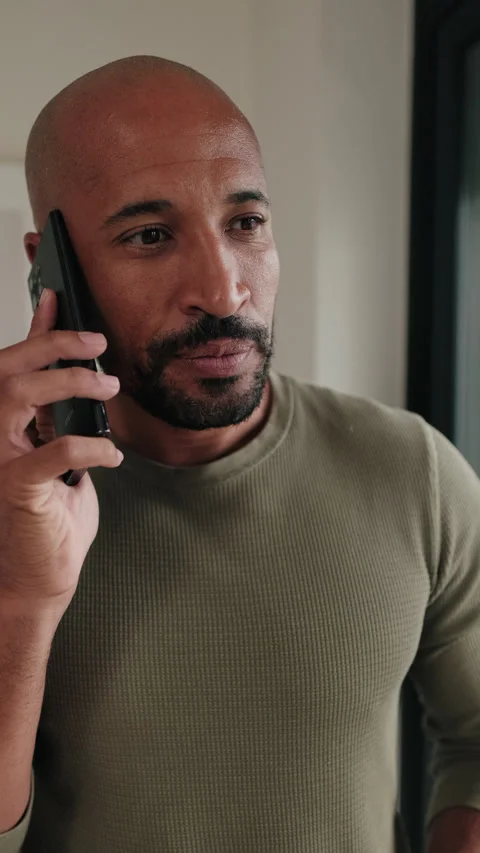 Vertical video, Man on Phone Receiving Bad News Stock Footage 316570588