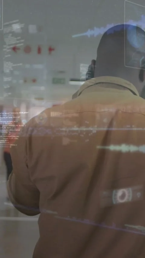 Vertical video: Man picking up phone and initiating work call in tech corridor, Stock Footage 332278207