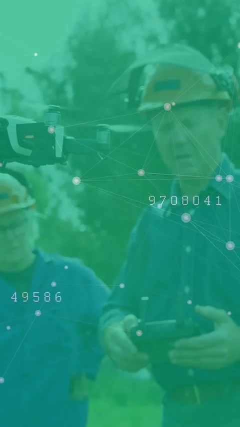 Vertical video: Man piloting remote as drone entering left, inspecting with AR Stock Footage 332669451