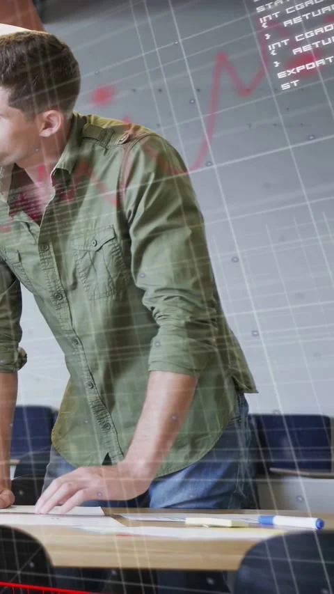 Vertical video: Man placing hands analyzing docs tech causing grid or code Stock Footage 333721177