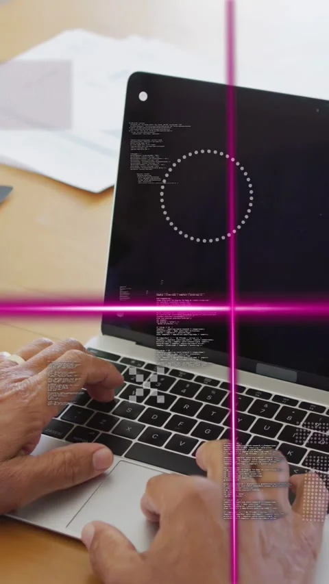 Vertical video: Man placing hands on keys coding for work as magenta overlay Stock Footage 334770744