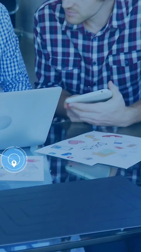 Vertical video: Man in plaid holding phone, checking social and activating data Stock Footage 333577468