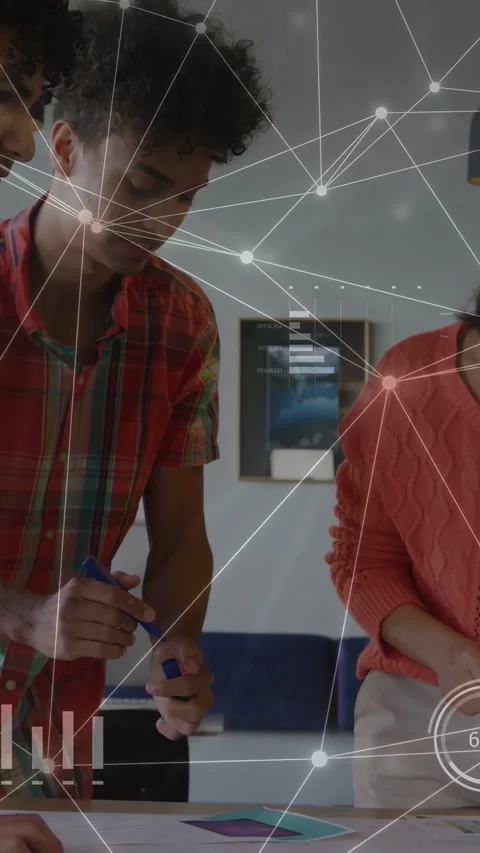 Vertical video: Man in plaid placing card, sparking business HUD nodes or gauges Stock-Footage 333542124