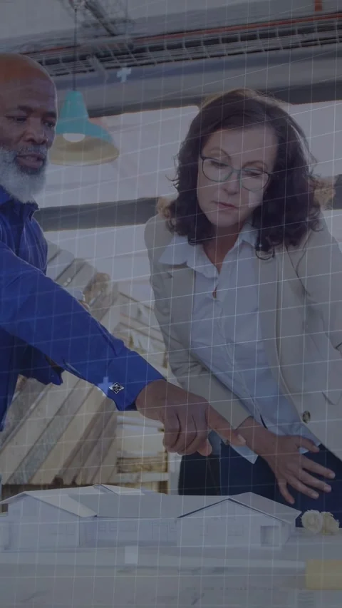 Vertical video: Man pointing model, woman leaning, code and grid appearing, both Stock Footage 335513436