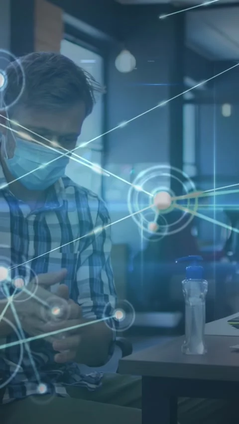 Vertical video: Man pressing pump and cleaning hands under node network growing Stock Footage 330358812