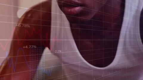 Vertical video: Man pulling lever and leaning into gym, animated charts updating Stock-Footage 331736444