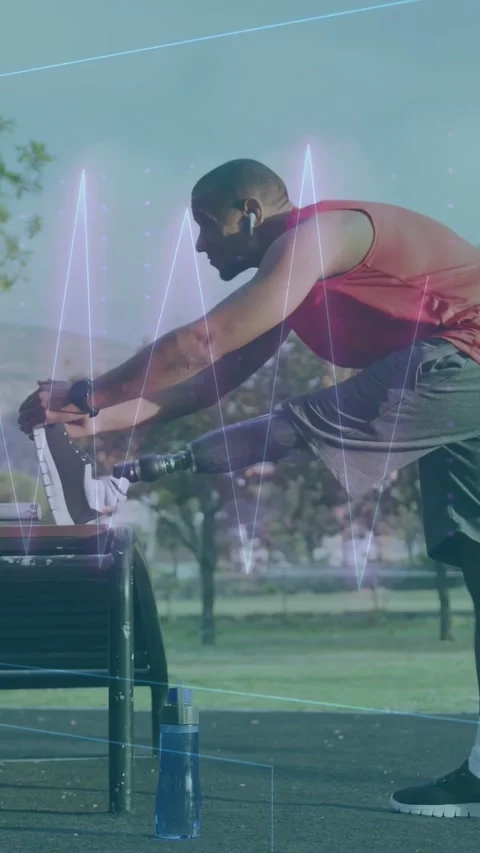 Vertical video: Man putting prosthetic on bench doing hamstring stretch with Stock Footage 333289182