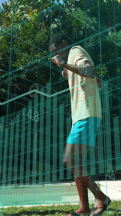 Vertical video: Man raising arms sparking friends playing poolside while tech Stock Footage 334025716