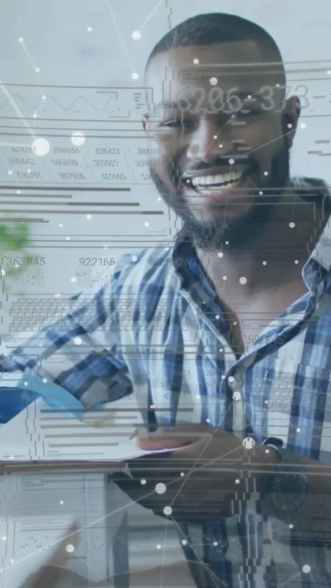 Vertical video: Man reaching binder checking biz docs smiling while data HUD Stock Footage 331238129