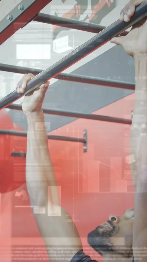 Vertical video: Man reaching gripping and pulling pullup bar in gym, HUD Stock Footage 333487370