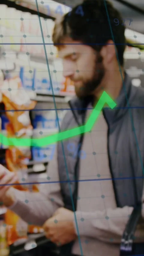 Vertical video: Man reaching shelf in shop grid graph appearing showing price Stock Footage 334187588