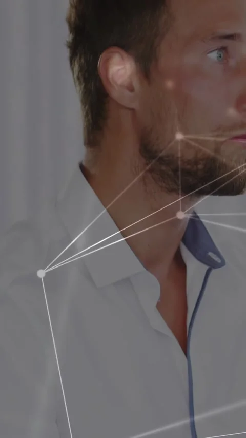 Vertical video: Man reacting to tech network sweep, turning head and speaking to Stock Footage 334541001