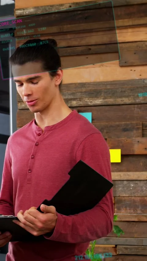 Vertical video: Man reading clipboard as woman bringing yellow folder and Stock Footage 335513650
