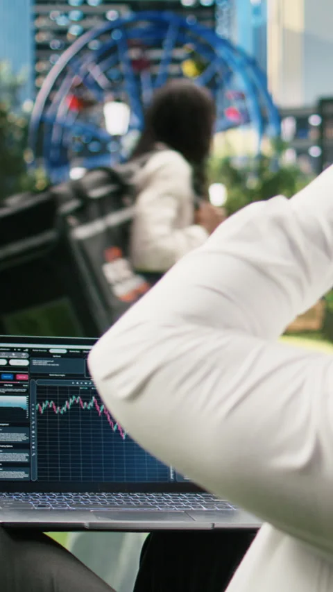 Vertical Video Man reading financial data graphs on forex web platform 스톡 동영상 344385117