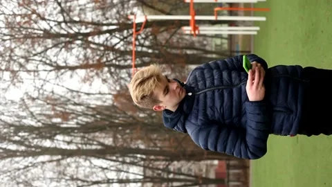 Vertical video as man reading online news and writes sms. Stock Footage 144224110
