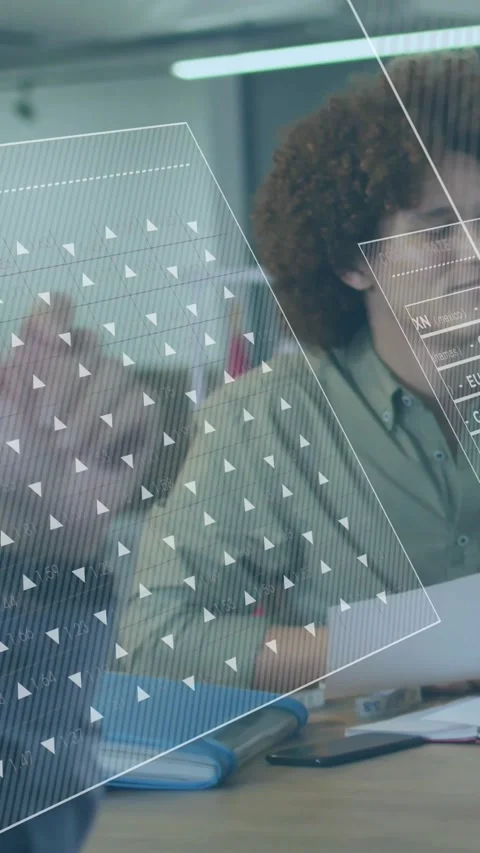 Vertical video: Man reading papers as HUD sliding in, highlighting business data Stock Footage 334544261