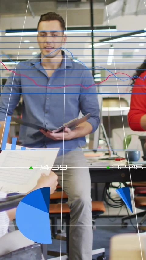 Vertical video: Man reading tablet after peer showing report charts over view Vídeo Stock 334770394