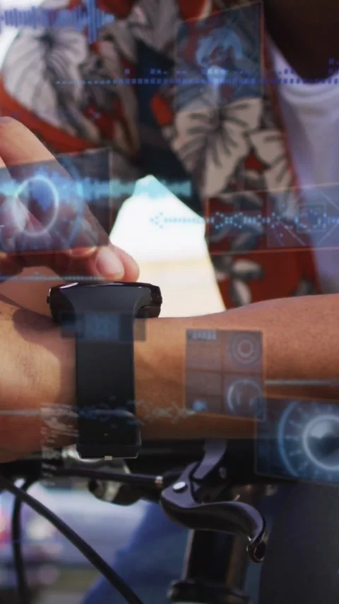 Vertical video: Man resting arm on bars, lifting watch and tapping, HUD tech Stock Footage 333836047