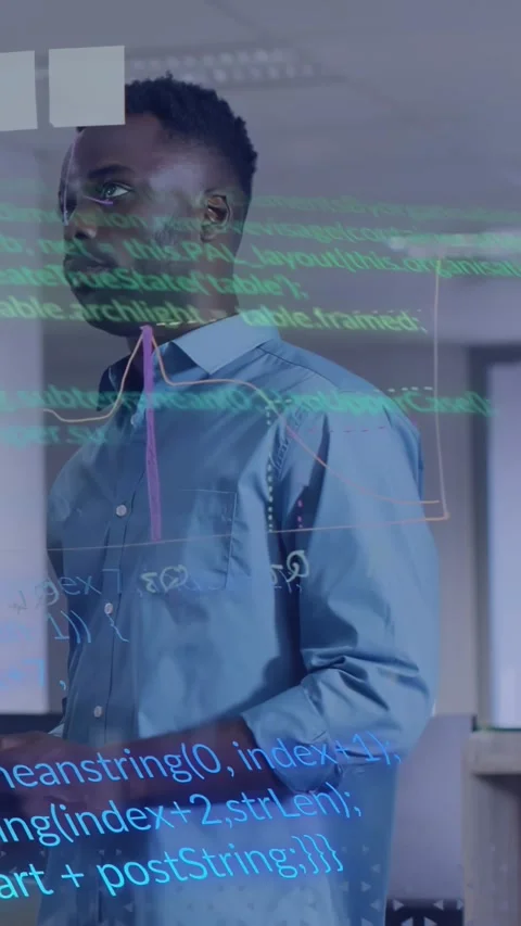 Vertical video: Man reviewing code and gesturing in tech office, causing code Stock Footage 332687422