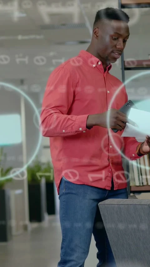 Vertical video: Man scanning doc with phone, activating HUD for business review Stock Footage 335355602