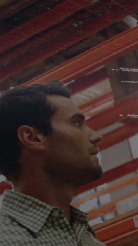 Vertical video: Man scanning racks while checking stock in warehouse, data Stock Footage 334547418