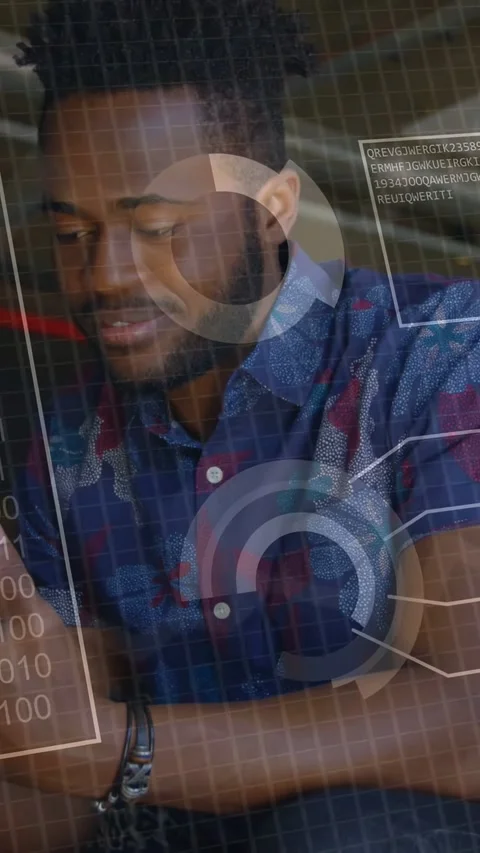 Vertical video: Man seated looking at phone, tapping and swiping to review tech Stock Footage 333487399