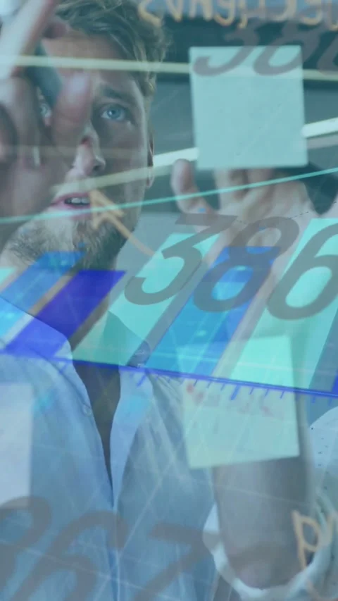 Vertical video: Man seeing data touching glass blue graphs matching marks Stock Footage 334601154