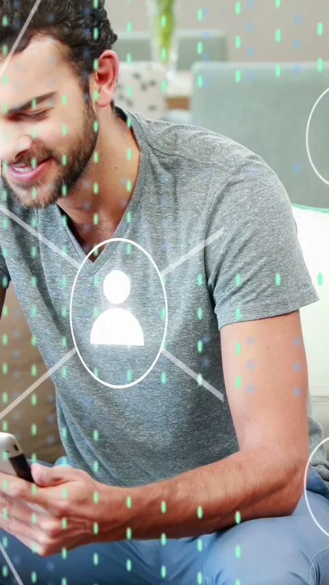 Vertical video: Man seeing user-icon overlay, picking smartphone and interacting Stock Footage 334770600