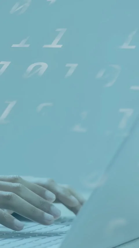 Vertical video: Man settling hands on laptop starting typing for data with Stock Footage 333745009