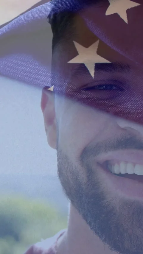 Vertical video: Man shifting to grin as star fabric moving, casting highlights Stock Footage 333289680