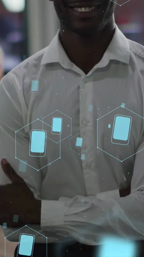 Vertical video: Man shifting hand as camera rising blue hex phone icons floating Stock Footage 333913183