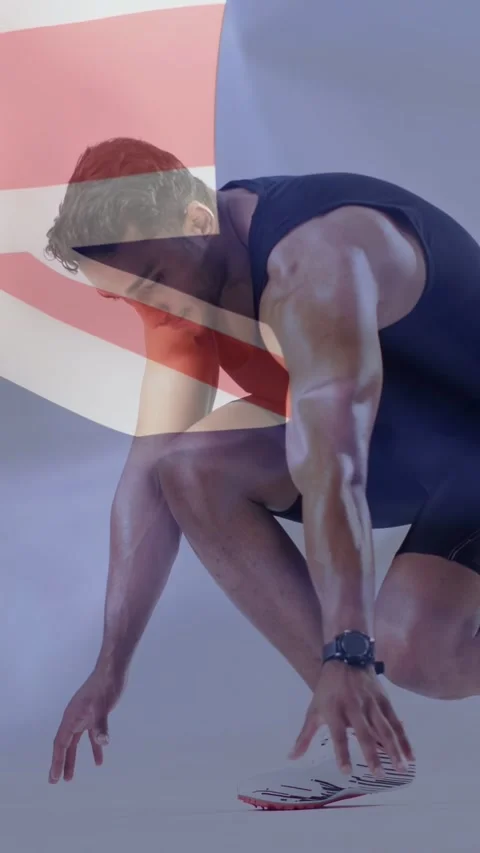 Vertical video: Man shifting weight, lowering to crouch readying for sport start Stock Footage 337538826