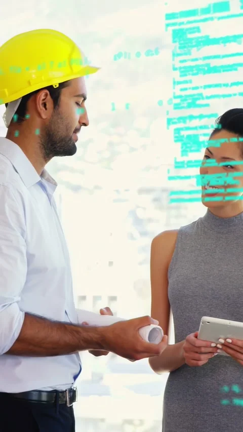 Vertical video: Man showing plans sparking woman using tab as teal code overlay Stock Footage 333487246